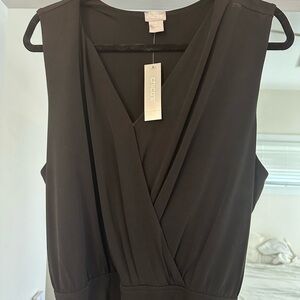 Chico’s Black faux wrap jumpsuit. Size 3 NWT
